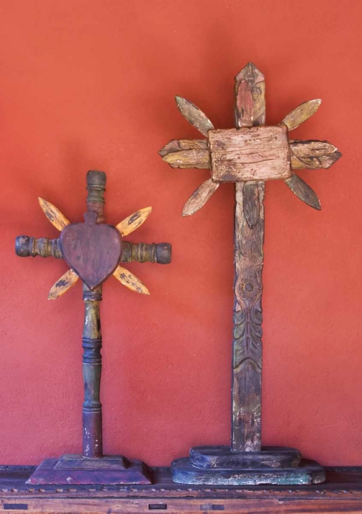 Mexico Two wooden crosses against red wall